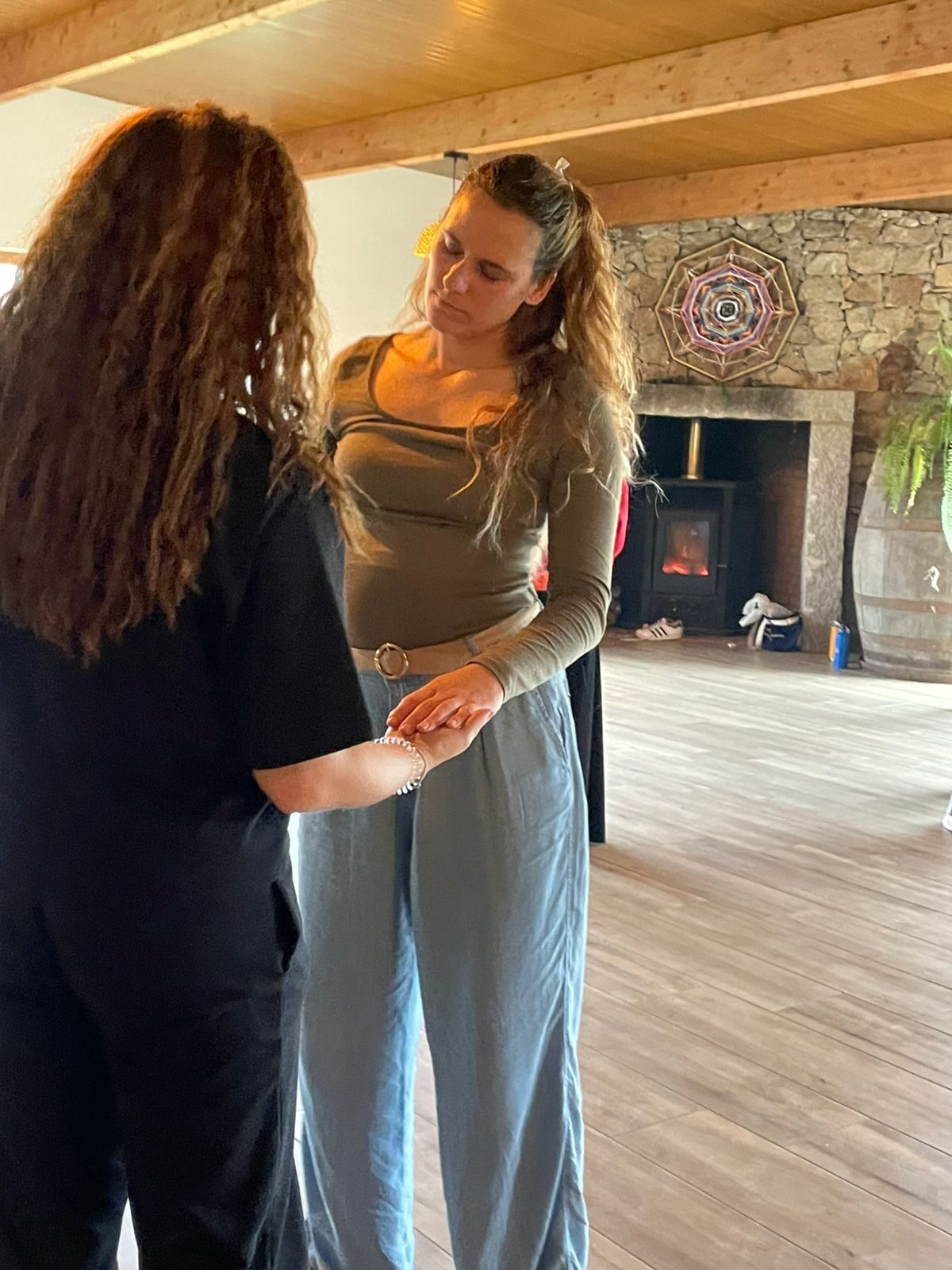 Ana holding space for a woman during a one-to-one systemic session
